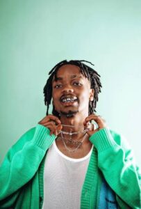 Lil Maina Biography, Education, Career, Controversies, And Net Worth